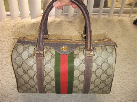 how to tell if a vintage gucci handbag is real|vintage Gucci small shoulder bag.